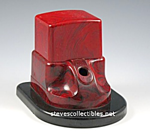 Early Streamlined Marbleized Red Plastic Inkwell