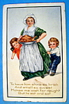 This original postcard is in good condition with slight wear. This Vintage Thanksgiving Day Postcard features an Embossed Design with a mother carrying a turkey on a platter and her two children.  Thi...