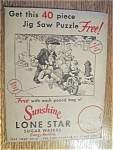 This vintage advertising 40 piece 1930's Sunshine Lone Star Wafer Puzzle is complete and features the cutest full color drawing of a young boy pushing a cart full of babies. It measures approx. 7 1/4&...