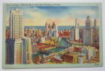 This vintage postcard is in Very Good condition. It features a View of the Loop, Chicago River and Lake Michigan, Chicago. This postcard measures approximately 5 1/2 x 3 1/2. The reverse side is unuse...