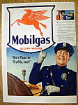 This fine vintage advertisement for a 1941 ad for Mobilgas is in very good condition but is slightly yellowed and has slight crinkling at the top. This vintage gas magazine advertisement measures appr...