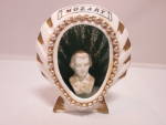 Mozart Figurine. A nice vintage, Bone China, Japan figurine with original foil label . Height 2 1/4 inch. Unique harder to find item. Mozart at center in the white bust that is gold washed on top of h...
