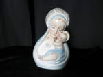 Virgin Mother Mary and Baby Jesus in her loving arms Planter Shafford Japan. Height 6 1/4 inch X 4 1/4 X 4 inch. No chips, cracks or crazing. Gold paint trim is in excellent condition. Marked with a s...