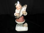 Indian Girl with Fish Figurine Fisher Japan. Cute as can be. Height 6 inch X 3 inch X 1 3/4 inch. No cracks or crazing. Fish has a chip on his tail. Stamp mark on bottom Fisher Japan 6E-6472. A must h...