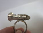 Vintage Japan Torpedo Space Shuttle Rocket Kids metal Toy Ring marked Japan. Used condition as seen.<BR><BR>Over all length 1 1/2 inches;<BR>Ring across inner center 5/8 of an inch.<BR><BR>Please ask ...