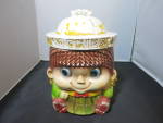 Girl Cookie Jar Sanyel Nagoya Japan imported by Woolworth. This jar is cute as can be and as most cold painted cookie jars a lot of the cold paint has been washed off. Still cute as can be. This jar h...
