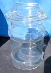 Vintage Clear Glass Milk Can Cookie Jar Dairy 1970s.  No chips or cracks. Height to rim no lid 7 1/2 inch. Height to top of lid handle 9 inch. Diameter 5 1/2 inch. A unique item with the handles on th...