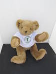Vermont Teddy Bear with Vermont Marketplace T Shirt. Vermont Teddy Bear Company Jointed Bear. Cute as can be with his white t shirt with green letters and Vermont State Logo. Reads Made in Vermont Mar...
