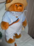 Raikes Bear #38585, Tom Sawyer the fisherman all original with his tags, hat and fishpole with a fish on the end. The tag reads Applause Inc. made in the Phillipines.  He is an 18 inch tall, brown fuz...