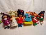 Cabbage Patch Posable Doll Figurines Set of 6 different figures from McDonald's marked 1992 and 1994. There is an African American girl skater in green with red, a dark haired girl in a plum colored d...