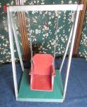 Vintage Wooden Doll Swing Circa 1940s. Awesome swing from the 1940s in original red, green and gray paint. Swings on a type of antique chain. <BR><BR>This is nailed together and is loose from years of...