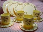 Ideal Doll and Childs Play Dish Set Toy Dinnerware set marked Ideal, U.S.A. It is made of a cream colored plastic with a great gold pattern. There are 4 dinner plates 6 1/4 inches wide, 4 saucers 4 in...
