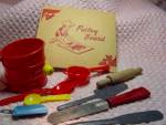 Vintage Toy Baking Set with some rare pieces to find. There is the 6 3/4 inch wide and 4 inches high pastry board, a red plastic sifter 3 inches high and 4 inches wide, wood rolling pin that really ro...