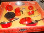 Just Like Mothers Toy Mirro Kitchen set never removed from the box marked Manhattan Cookware, just like Mother's, safe, washable and non toxic. It has the dutch oven with the cover, sauce pan, coffee ...