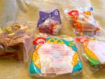 McDonald's Happy Meal Toys set of 5 with 4 never removed from the packages. There is a Jasmine figure from Aladdin 1996, and Aladdin Disney figure, Ronald McDonald figure 1995, an opened Hello Kitty 2...
