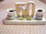 50th. Anniversary Candle Holder in the double style on a base with a paper Made in Japan label. This is a very different set and a lovely table piece. Note the bottom it is not like the Norcrest versi...