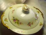 Meito China Covered casserole dish Japan marked Meito China made in Japan in a crown mark. This is a wonderful hand painted in elaborate detail with multi-color flowers, scallops, and gold details.It ...