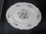 Homer Laughlin Spring Time Marigold Platter 11 3/4 inch. Stamped K48NR.<BR><BR>No Chips, No cracks and no crazing. Has some use scratches and silver trim wear as seen in pictures.<BR><BR>Please ask an...