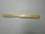 Bone Toothbrush marked Japan and Larkin. This is unusual being marked Japan and Larkin. Larkin was a US company that first started out making soaps etc and later furniture. Japan made a lot of toothbr...