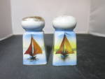 Vintage Sailboat salt and pepper shakers made in Japan. Complete with cork stoppers. Plus one sounds like it has a cork stopper inside. <BR><BR>No Chips No Cracks No Crazing. One shaker has most of th...