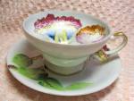 Trimont China Occupied Japan Cup and Saucer Set. Fantastic Hand Painted very lovely in excellent condition with a beautifully colored flower and leaves design with wonderful gold accents and trim. The...