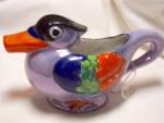 Bird Pitcher Lusterware Made in Japan with lovely color and detail. It is made of a light blue lustreware with the great hand painted colors. It is in great condition with some paint chips and is mark...