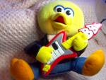 Big Bird Toy is musical and animated stuffed bird tagged Henson by Tyco from 1999. He is a cute stuffed big bird in yellow with a shiny black jacket, jeans and holding his guitar. He sings, talks and ...