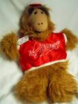 Alf Puppet stuffed with his Orbiter's original red and white silky shirt and matching cap. He is in great condition and is tagged Alien Productions, 1988. He has the slot in his back to insert your ha...
