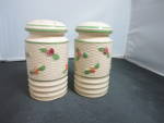 Vintage Range Salt and Pepper Shakers Made in Japan Circa 1930s to 1940s.<BR><BR>This is a larger pair height 5 inch X over all diameter 2 5/8 inch. These shakers were used in the kitchen and normally...