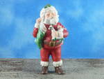 Hallmark Keepsake Porcelain Figurine Ornament Jolly St. Nick, 1986, 5 3/4" high.  New in box, figurine in excellent condition, light box wear on the 34 year old box. 