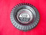 Advertisement Tire Ashtray for General Tire.  Center of the Glass Tray insert says General Tire Service 1725 E. Market St. Akron, Ohio 44309.  Tire measures 6 1/2" across.  Very good condition.  ...