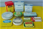 Large lot of early Drug/Pharmaceutical Tins.  Probably all from the 1940's to 50's era.  Include the following:  Hygeinic Cutigiene Toilet Cream, Porter's Liniment Salve, Rexall Epsom Salt 4 & 8 ozs.,...