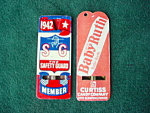 Pair of Advertisement Whistles.  One is Baby Ruth and the other is The Safety Guard Member dated 1942.  The Baby Ruth Whistle is probably around the same era.  These measure around 2 1/2 to 2 3/4"...