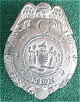 Child's G-Men Toy Badge circa 1930's to 40's.  Badge measures about 1 3/4" across.  Some tarnish is evident on the front as well as on the back.  Great for a beginning collector of early Child's ...