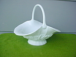 Offered is Large Milk Glass Handled Fruit Basket.  From Handle to Handle across Basket measures about 7 1/2" and measures 12 1/2" in length.  Height is about 10".  Has a nice Fruit desi...
