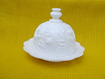 Large Milk Glass Round Butter & Cover made by the Imperial Glass Co.  Measures 7 1/2" in diameter 5 1/2" in height.  Cover has a Rose design.  Bottom is marked with the IG logo.  Excellent c...