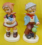 Cute pair of Hummel-Like Figurines featuring Boy & Girl.  They measure about 5" in height and are in excellent condition.  No markings but probably from Japan.  Great to add to any Figurine colle...