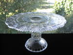 Also known as Block w/Fan, Block w/Fan Border and Romeo, this attractive pattern was produced by Richards & Hartley circa 1885 and by U. S. Glass circa 1891.<BR><BR>This beautiful cake stand features ...