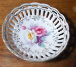BEAUTIFUL 5 INCH PORCELAIN HAND PAINTED VICTORIAN FLORAL BOWL. GOLD LEAF EDGE MADE BY DPAIN JAPAN. MEASURE 5L X 1 1/2D INCHES. NO CHIPS OR CRACKS. EXCELLENT CONDITION. ADD $8.00 SHIPPED IN THE USA. RE...