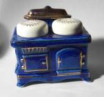HERE`A A REALLY NICE VINTAGE 1960`S BLUE STOVE STYLE SALT & PEPPER SHAKER SET LOOKS TO BE HAND PAINTED WITH GOLD LEAF TRIM??. MEASURES 3 1/4W X 2 1/4D X 2 1/2H INCHES. NO CHIPS OR CRACKS ON STOVE. THE...