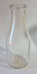 VINTAGE EMBOSSED 1 QUART C. M. RICE MILK BOTTLE - BOTTOM E 29 -  SCUFFING FROM REFILLING - NO CRACKS -  SMALL NICK CHIPS ON SIDES - SCRATCHES FROM BEING REFILLED NEEDS  A LITTLE MORE CLEANING ADD $10....