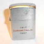 1917 DURAMETALLIC 1957 ADVERTISING LIGHTER. PRICE ASSOCIATES SPRINGFIELD MASS. NICE SPARK. DENT ON LID. MEASURES 1 7/8L X 1 1/8W INCHES. ADD $5.00 SHIPPED IN THE USA.REF:111957 