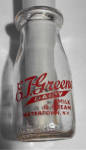 OLD 1/2 PINT E.T. GREENE DAIRY MILK & CREAM WATERTOWN N.Y. MILK BOTTLE. HAS 2 DIFFERENT PICTURES ON THE BOTTLE. EMBOSSED ON THE SIDES OF THE BOTTLE SAYS: HALF PINT LIQUID MTC REGISTERED  E 47 ON THE B...
