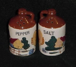 Relco Japan salt and pepper shaker. They look like whiskey jugs, with a country house setting and a big yellow bird. Both are the same. No chips or cracks. They don't have plugs in them. Sold as is. W...
