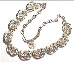 Fantastic ornate gold plated, ten section, high quality faux pearl necklace, in excellent condition (see other views), and measuring about 16 inches in length. 'Lisner' manufacturers markings on clasp...