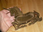 Neat find out of a home, a brass tray, ash tray or pin dish in the shape of a unicorn.  We believe this dates to the 1970's but there is no country of origin or manufacturer marking on this piece.<BR>...
