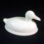 A replacment cover for the milk glass duck covered dish or container, originally made by McKee in the late 1800s, then produced by Kemple Glass in the 1940s from the original McKee mold. The duck has ...