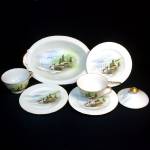 Three plates, two teacups, a vegetable serving bowl, and a lid are what remains of this vintage hand painted Oriental scenic porcelain china dinnerware set. The scene on each gold-trimmed piece depict...