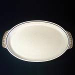 This big deep welled oval platter is called the oval roaster in the Percussion Temper-Ware dinnerware pattern by Lenox. Introduced in the mid 1970s, Percussion is an almost masculine pattern on stonew...