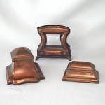 This 3-piece antique cast bronze desk set was made by Jennings Brothers in the early 1900s. The inkwell has a built-in pen rest at the front and is 2-3/4" high. The milk glass insert cup is clean...